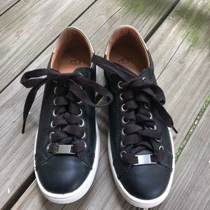 Ugg women’s Milo black leather and metallic sneakers size 6